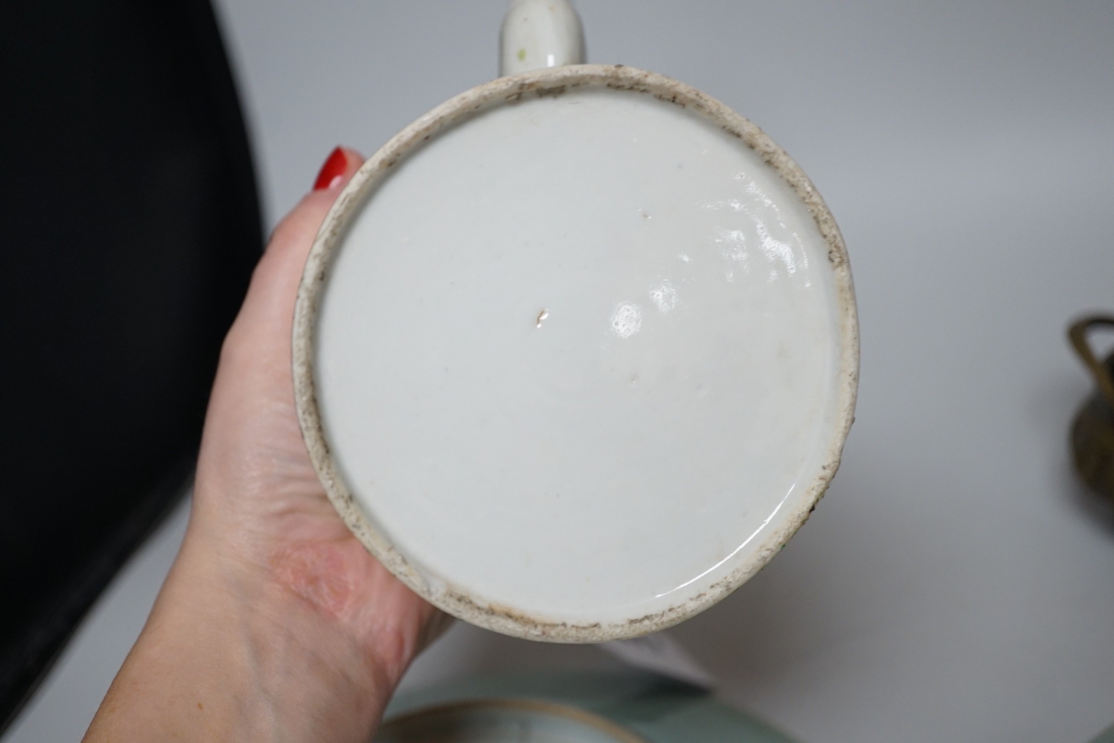 A pair of Chinese celadon ground famille rose plates, a Chinese famille rose tea pot and a bronze censer, plates 26cms diameter